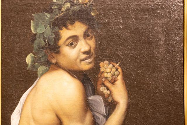 קרוואג'ו - יצירת "הילד עם סל הפירות": מה אומרת הבעת הפנים?